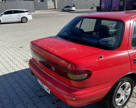 Красный Киа Сефия, объемом двигателя 1.6 л и пробегом 200 тыс. км за 1400 $, фото 2 на Automoto.ua