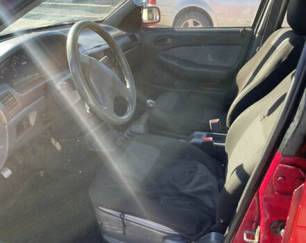 Красный Киа Сефия, объемом двигателя 1.6 л и пробегом 200 тыс. км за 1400 $, фото 15 на Automoto.ua