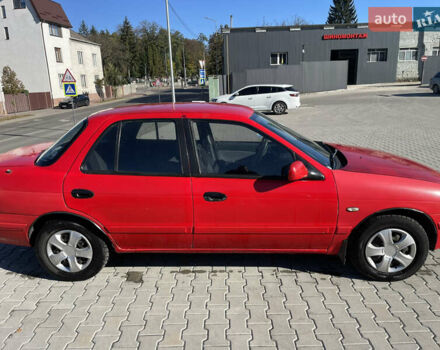 Красный Киа Сефия, объемом двигателя 1.6 л и пробегом 200 тыс. км за 1400 $, фото 1 на Automoto.ua