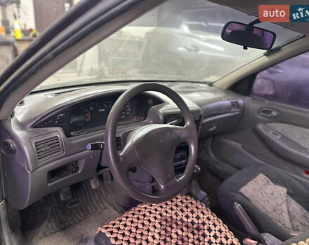 Червоний Кіа Сефія, об'ємом двигуна 1.6 л та пробігом 150 тис. км за 1000 $, фото 6 на Automoto.ua