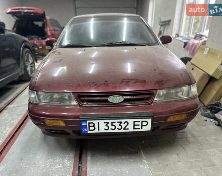 Червоний Кіа Сефія, об'ємом двигуна 1.6 л та пробігом 150 тис. км за 1000 $, фото 2 на Automoto.ua