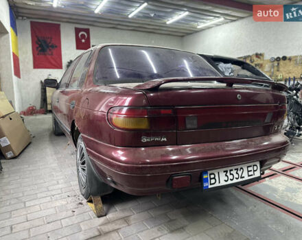 Червоний Кіа Сефія, об'ємом двигуна 1.6 л та пробігом 150 тис. км за 1000 $, фото 4 на Automoto.ua