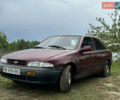 Красный Киа Сефия, объемом двигателя 1.6 л и пробегом 400 тыс. км за 1500 $, фото 1 на Automoto.ua