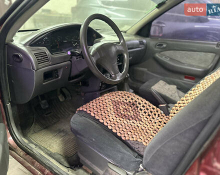 Червоний Кіа Сефія, об'ємом двигуна 1.6 л та пробігом 150 тис. км за 1000 $, фото 7 на Automoto.ua