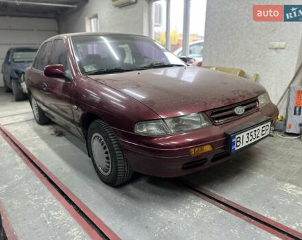 Червоний Кіа Сефія, об'ємом двигуна 1.6 л та пробігом 150 тис. км за 1000 $, фото 1 на Automoto.ua