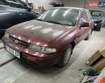 Червоний Кіа Сефія, об'ємом двигуна 1.6 л та пробігом 150 тис. км за 1000 $, фото 3 на Automoto.ua