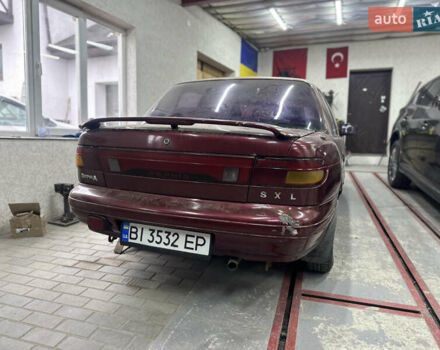 Червоний Кіа Сефія, об'ємом двигуна 1.6 л та пробігом 150 тис. км за 1000 $, фото 5 на Automoto.ua