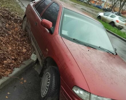 Красный Киа Сефия, объемом двигателя 1.6 л и пробегом 195 тыс. км за 474 $, фото 4 на Automoto.ua