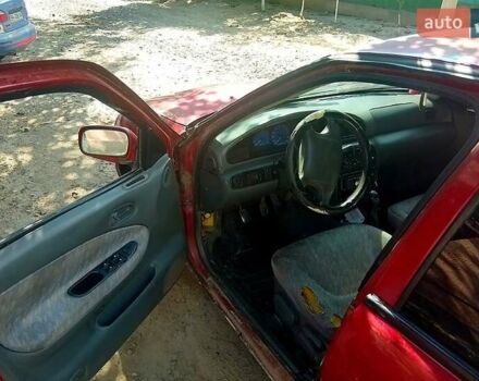 Красный Киа Сефия, объемом двигателя 1.8 л и пробегом 261 тыс. км за 750 $, фото 3 на Automoto.ua