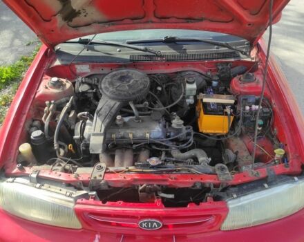Красный Киа Сефия, объемом двигателя 0.15 л и пробегом 303 тыс. км за 800 $, фото 7 на Automoto.ua