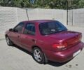 Червоний Кіа Сефія, об'ємом двигуна 1.5 л та пробігом 252 тис. км за 2000 $, фото 1 на Automoto.ua