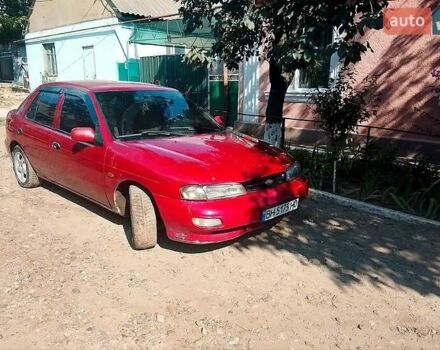 Красный Киа Сефия, объемом двигателя 1.8 л и пробегом 261 тыс. км за 750 $, фото 1 на Automoto.ua