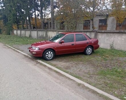 Червоний Кіа Сефія, об'ємом двигуна 1.5 л та пробігом 65 тис. км за 1550 $, фото 1 на Automoto.ua