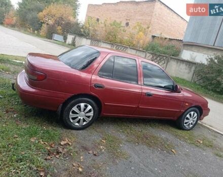 Красный Киа Сефия, объемом двигателя 1.5 л и пробегом 65 тыс. км за 1550 $, фото 7 на Automoto.ua