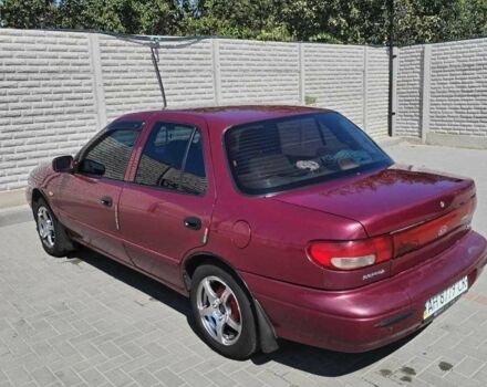 Красный Киа Сефия, объемом двигателя 1.5 л и пробегом 252 тыс. км за 2000 $, фото 1 на Automoto.ua
