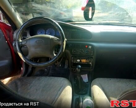 Красный Киа Сефия, объемом двигателя 1.8 л и пробегом 261 тыс. км за 750 $, фото 5 на Automoto.ua