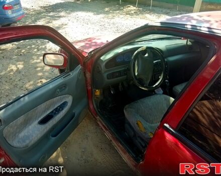 Красный Киа Сефия, объемом двигателя 1.8 л и пробегом 261 тыс. км за 750 $, фото 4 на Automoto.ua