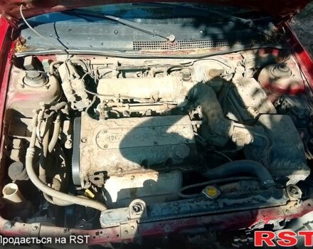 Красный Киа Сефия, объемом двигателя 1.8 л и пробегом 261 тыс. км за 750 $, фото 6 на Automoto.ua