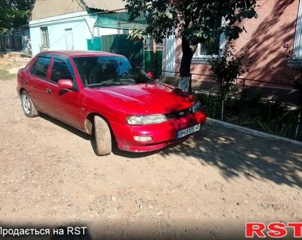 Красный Киа Сефия, объемом двигателя 1.8 л и пробегом 261 тыс. км за 750 $, фото 2 на Automoto.ua