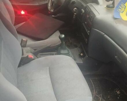 Красный Киа Сефия, объемом двигателя 1.5 л и пробегом 255 тыс. км за 1000 $, фото 1 на Automoto.ua