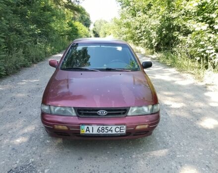 Красный Киа Сефия, объемом двигателя 1.5 л и пробегом 123 тыс. км за 850 $, фото 1 на Automoto.ua