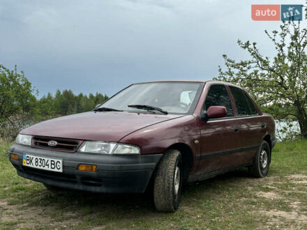 Киа Сефия 1995 в Коростене на Automoto.ua Красный Киа Сефия, объемом двигателя 1.6 л и пробегом 400 тыс. км за 1500 $, фото 1 на Automoto.ua