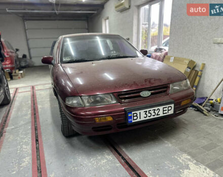 Червоний Кіа Сефія, об'ємом двигуна 1.6 л та пробігом 150 тис. км за 1000 $, фото 1 на Automoto.ua