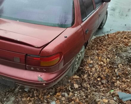 Красный Киа Сефия, объемом двигателя 1.6 л и пробегом 195 тыс. км за 474 $, фото 1 на Automoto.ua