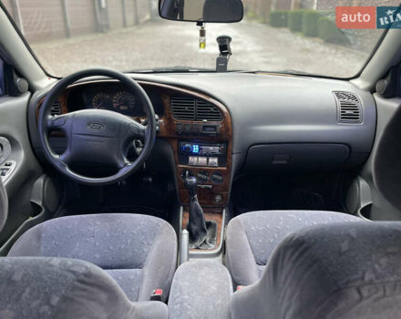 Серый Киа Сефия, объемом двигателя 1.6 л и пробегом 301 тыс. км за 1200 $, фото 11 на Automoto.ua