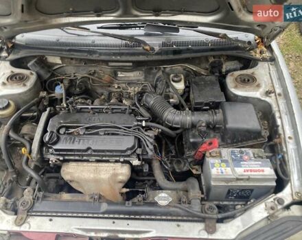 Серый Киа Сефия, объемом двигателя 1.59 л и пробегом 301 тыс. км за 950 $, фото 4 на Automoto.ua