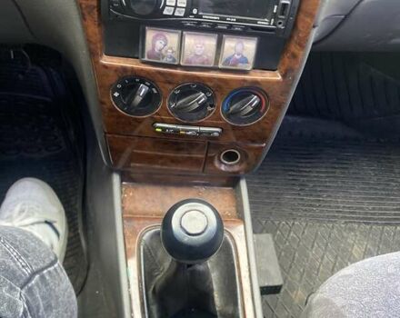 Серый Киа Сефия, объемом двигателя 1.59 л и пробегом 301 тыс. км за 950 $, фото 7 на Automoto.ua