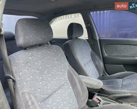 Серый Киа Сефия, объемом двигателя 1.6 л и пробегом 301 тыс. км за 1200 $, фото 13 на Automoto.ua