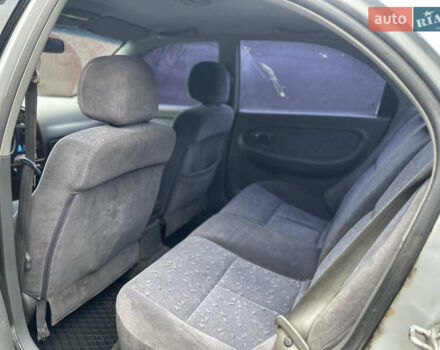 Серый Киа Сефия, объемом двигателя 1.6 л и пробегом 301 тыс. км за 1200 $, фото 10 на Automoto.ua