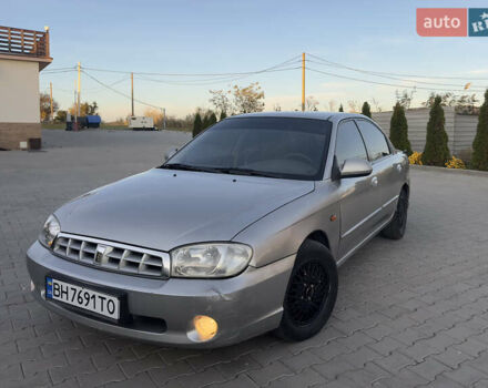 Серый Киа Сефия, объемом двигателя 1.59 л и пробегом 271 тыс. км за 2499 $, фото 1 на Automoto.ua