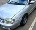 Серый Киа Сефия, объемом двигателя 1.6 л и пробегом 350 тыс. км за 1400 $, фото 1 на Automoto.ua