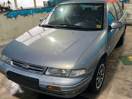 Серый Киа Сефия, объемом двигателя 1.6 л и пробегом 366 тыс. км за 2300 $, фото 1 на Automoto.ua