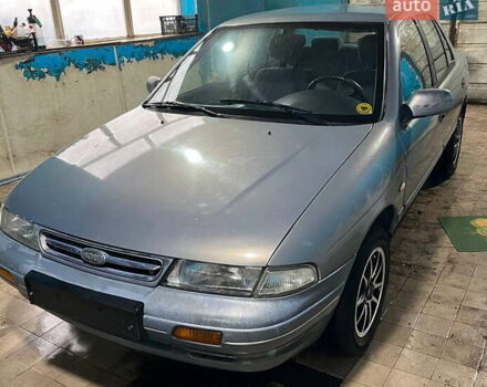 Серый Киа Сефия, объемом двигателя 1.6 л и пробегом 366 тыс. км за 2300 $, фото 1 на Automoto.ua