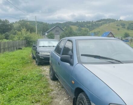 Серый Киа Сефия, объемом двигателя 1.5 л и пробегом 200 тыс. км за 300 $, фото 1 на Automoto.ua