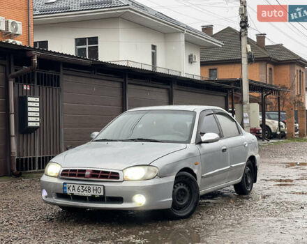 Серый Киа Сефия, объемом двигателя 1.6 л и пробегом 301 тыс. км за 1200 $, фото 1 на Automoto.ua