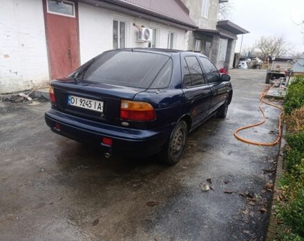 Синий Киа Сефия, объемом двигателя 1.8 л и пробегом 235 тыс. км за 1000 $, фото 2 на Automoto.ua