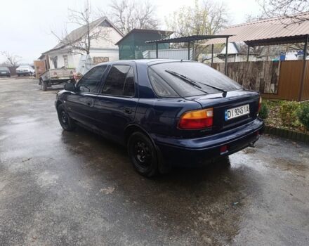 Синий Киа Сефия, объемом двигателя 1.8 л и пробегом 235 тыс. км за 1000 $, фото 3 на Automoto.ua