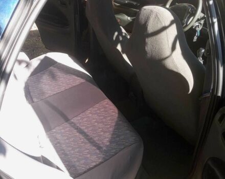 Синий Киа Сефия, объемом двигателя 1.8 л и пробегом 230 тыс. км за 1100 $, фото 5 на Automoto.ua