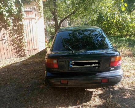 Синий Киа Сефия, объемом двигателя 1.8 л и пробегом 230 тыс. км за 1100 $, фото 2 на Automoto.ua