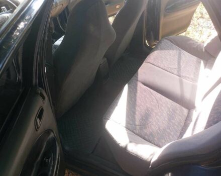 Синий Киа Сефия, объемом двигателя 1.8 л и пробегом 230 тыс. км за 1100 $, фото 6 на Automoto.ua