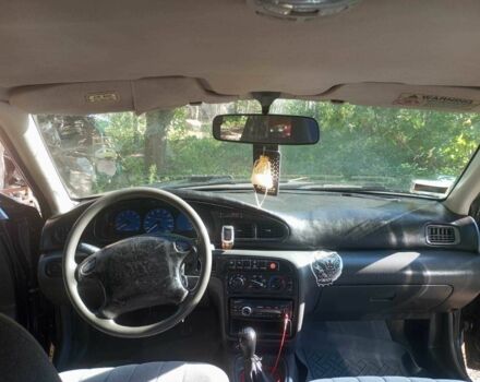 Синий Киа Сефия, объемом двигателя 1.8 л и пробегом 230 тыс. км за 1100 $, фото 7 на Automoto.ua