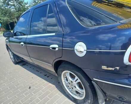 Синій Кіа Сефія, об'ємом двигуна 1.5 л та пробігом 145 тис. км за 1400 $, фото 3 на Automoto.ua