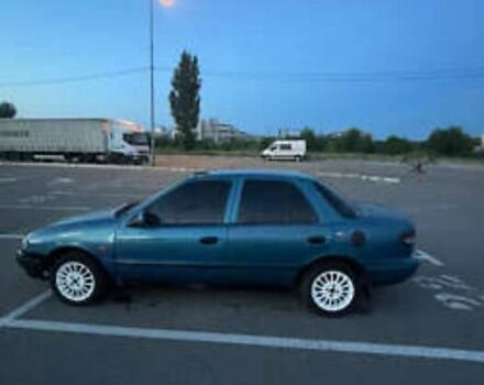 Синий Киа Сефия, объемом двигателя 1.6 л и пробегом 450 тыс. км за 800 $, фото 1 на Automoto.ua