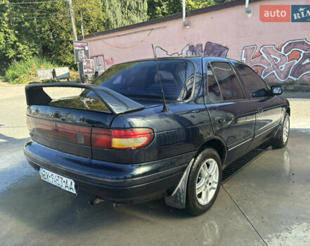 Синий Киа Сефия, объемом двигателя 1.5 л и пробегом 261 тыс. км за 1499 $, фото 3 на Automoto.ua
