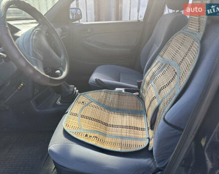 Синий Киа Сефия, объемом двигателя 1.5 л и пробегом 261 тыс. км за 1499 $, фото 9 на Automoto.ua