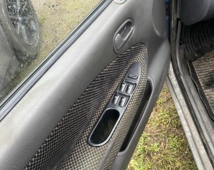 Синий Киа Сефия, объемом двигателя 1.5 л и пробегом 200 тыс. км за 710 $, фото 4 на Automoto.ua